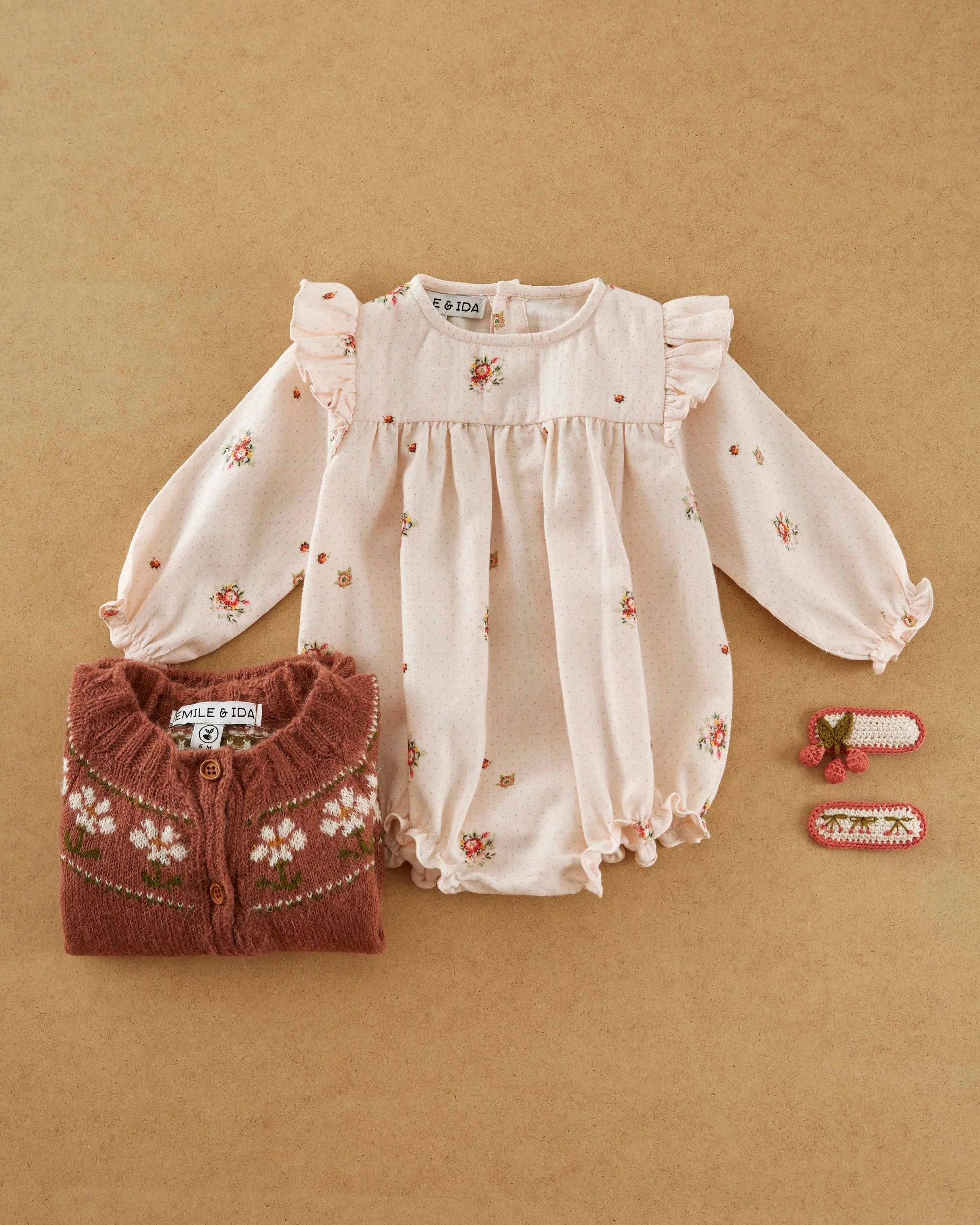 Pale pink flowers romper