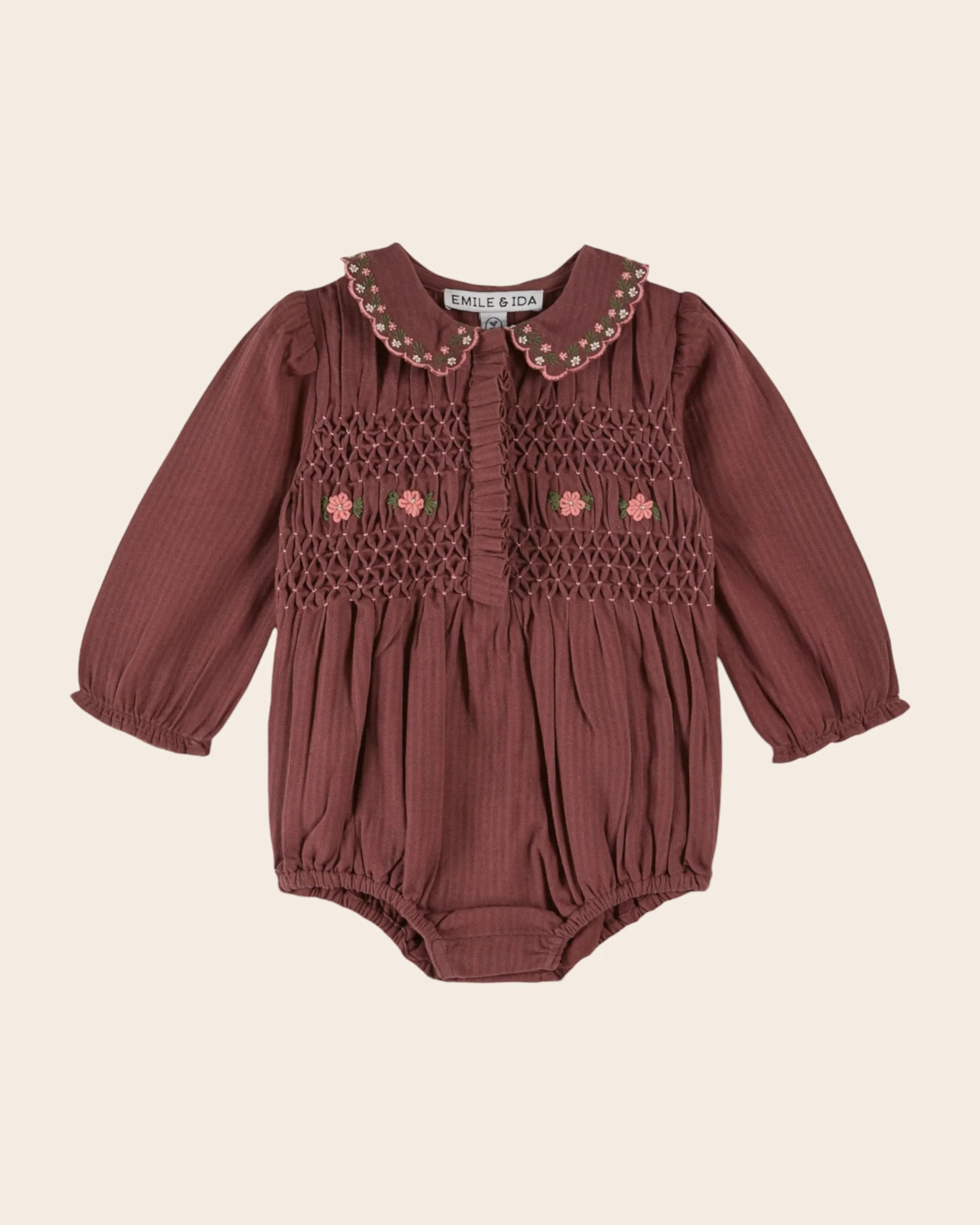 Purple smocked embroidered romper