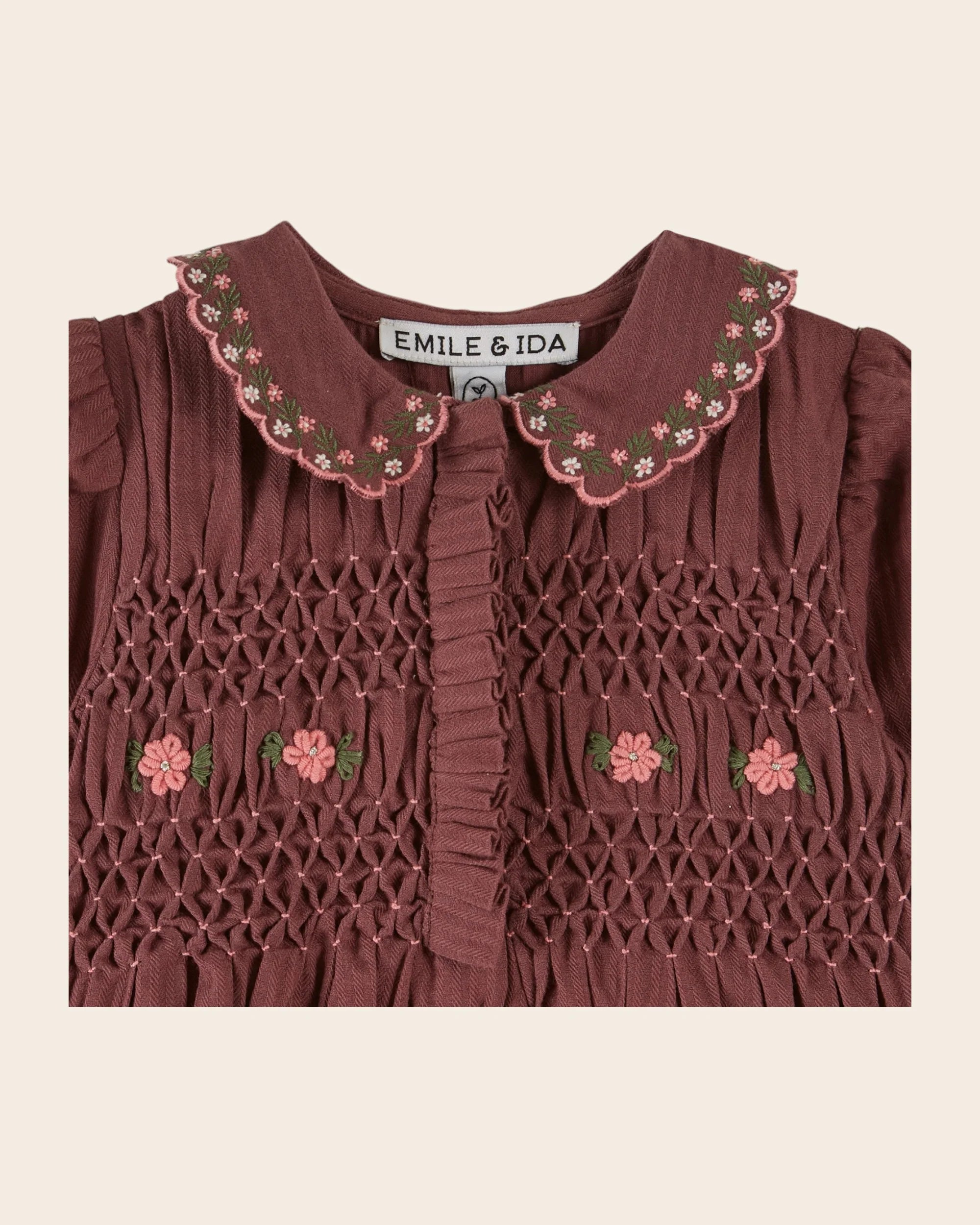 Purple smocked embroidered romper