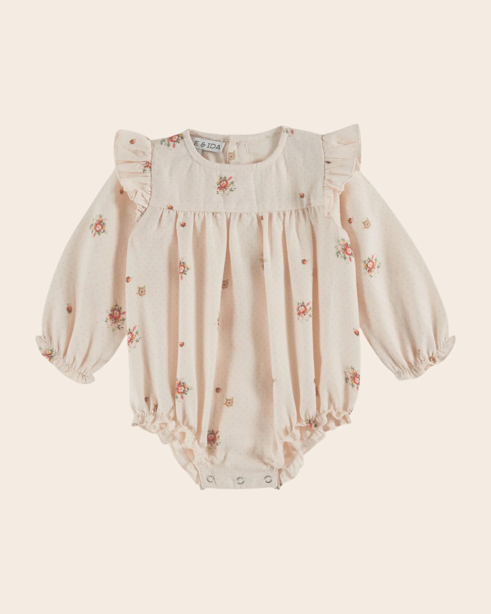 Pale pink flowers romper