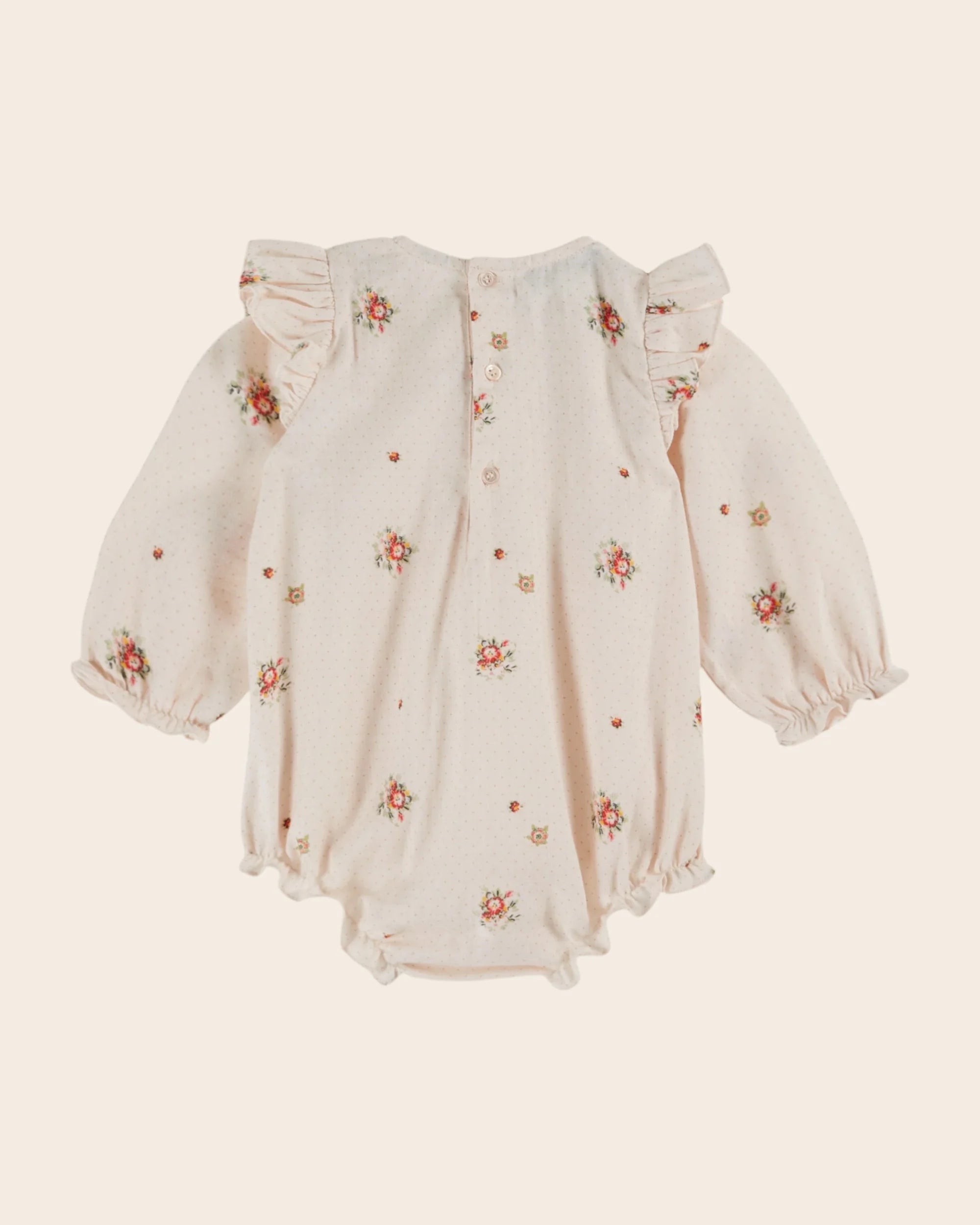 Pale pink flowers romper